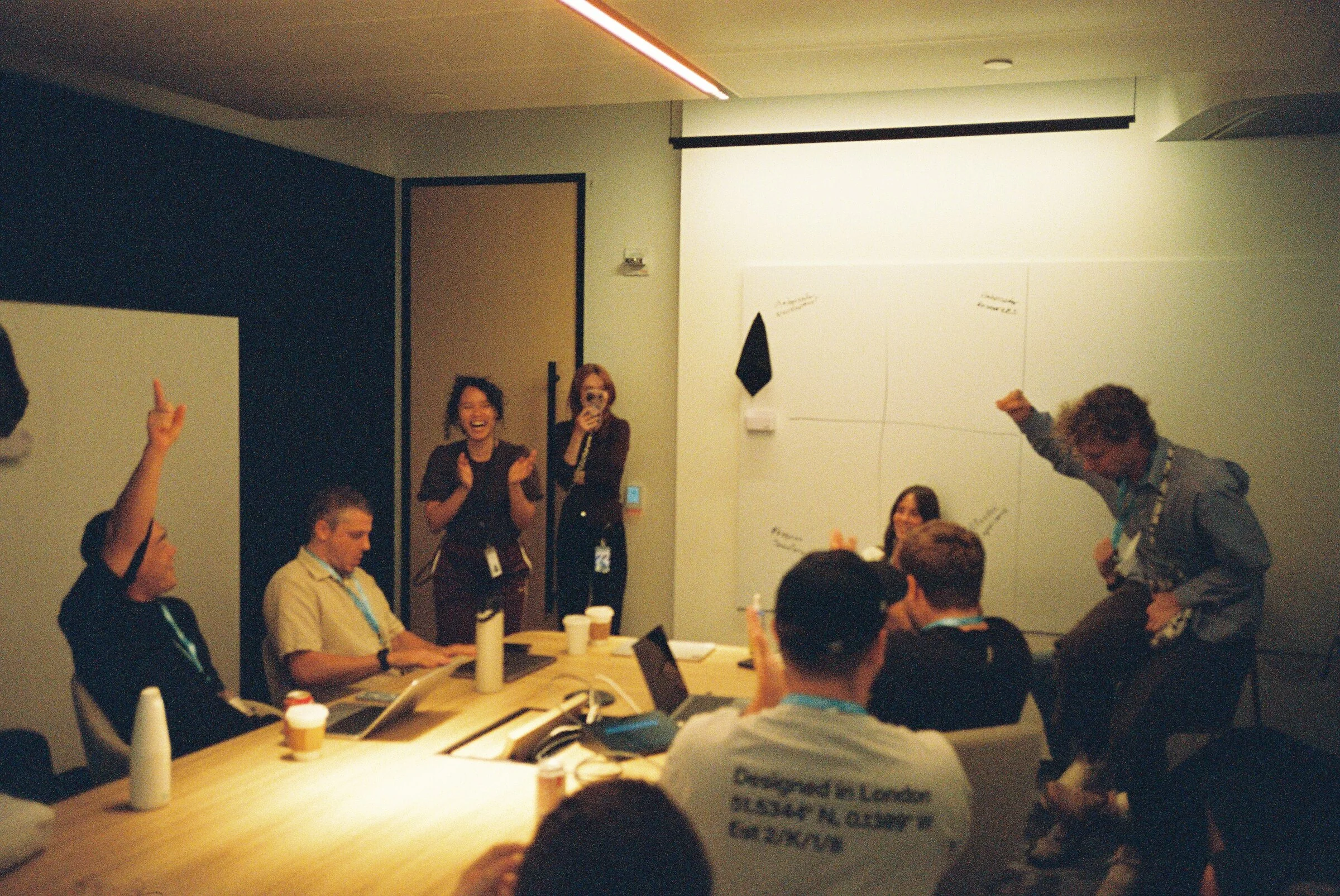 A workshop in full swing, someone raising an arm
