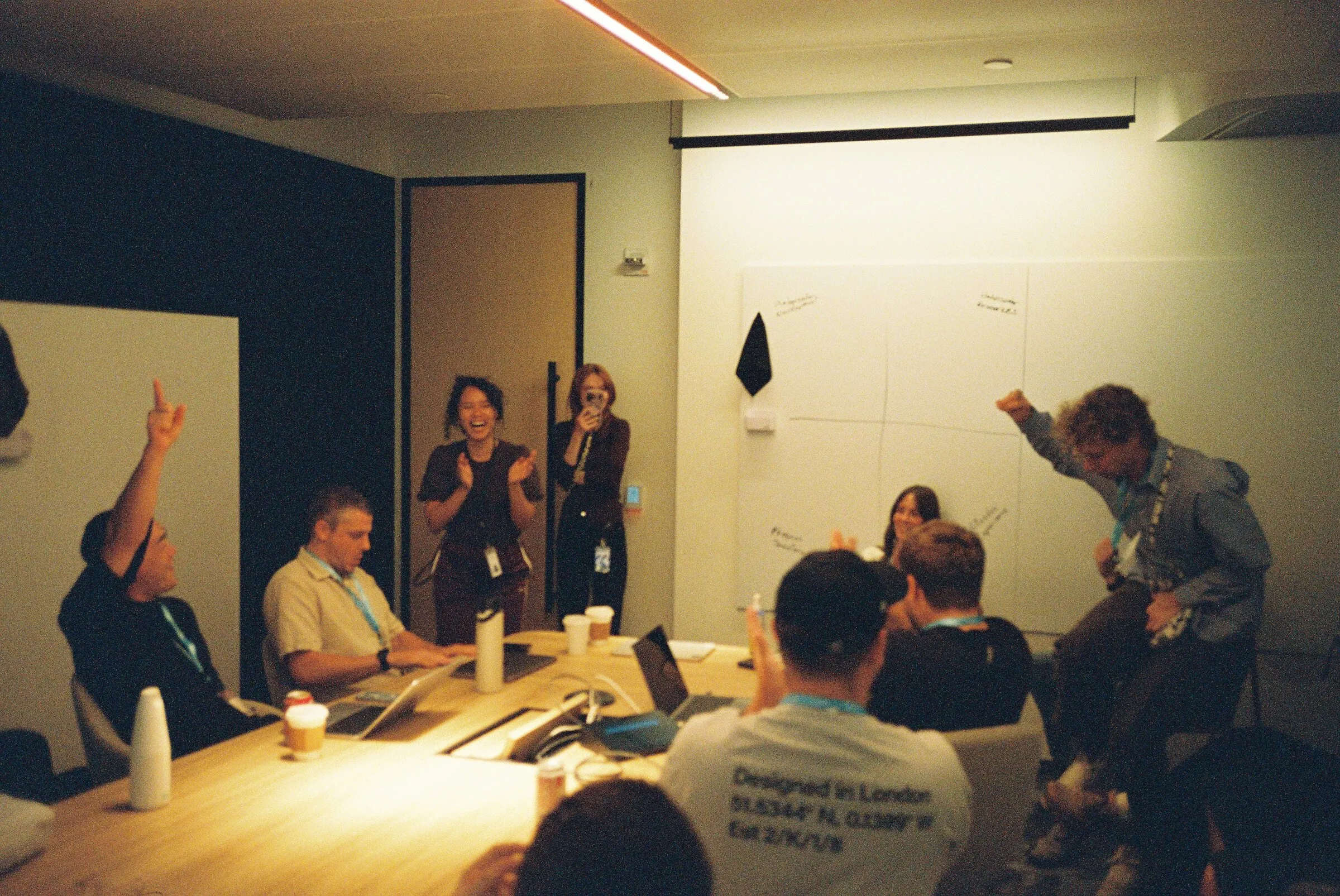 A workshop in full swing, someone raising an arm