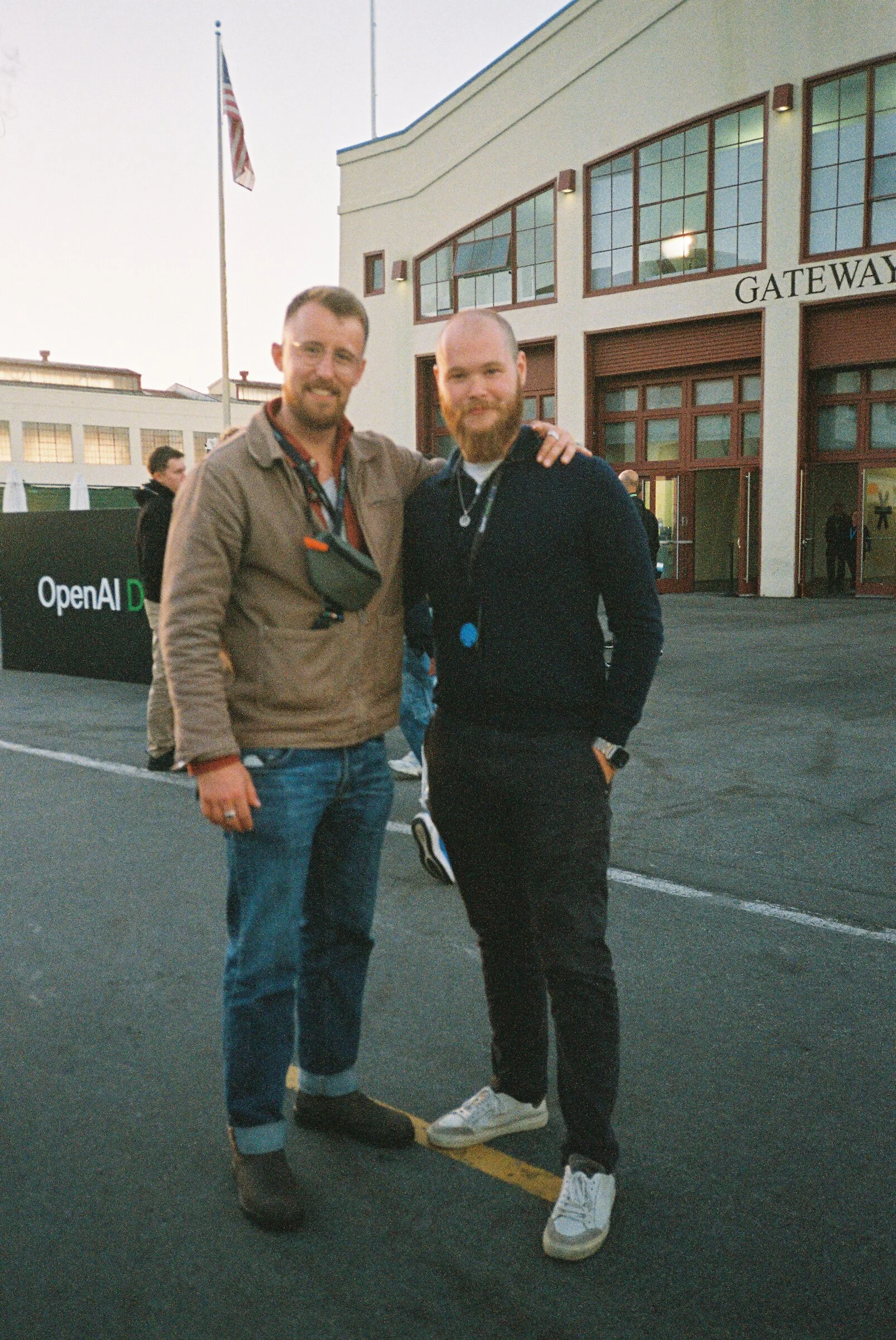 Two men standing outside the Gateway Pavilion